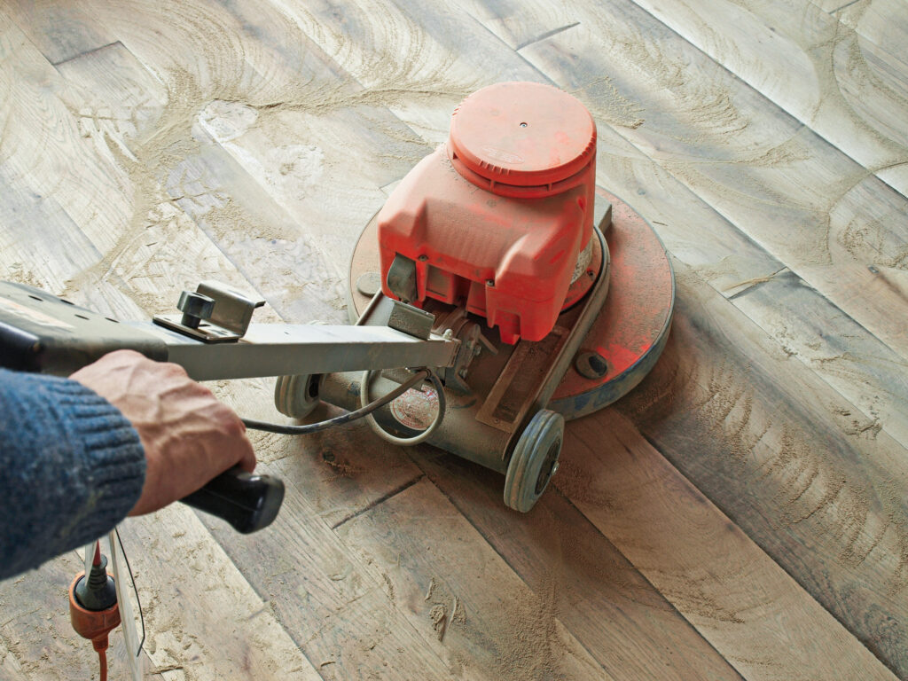 Sanding engineered hardwood