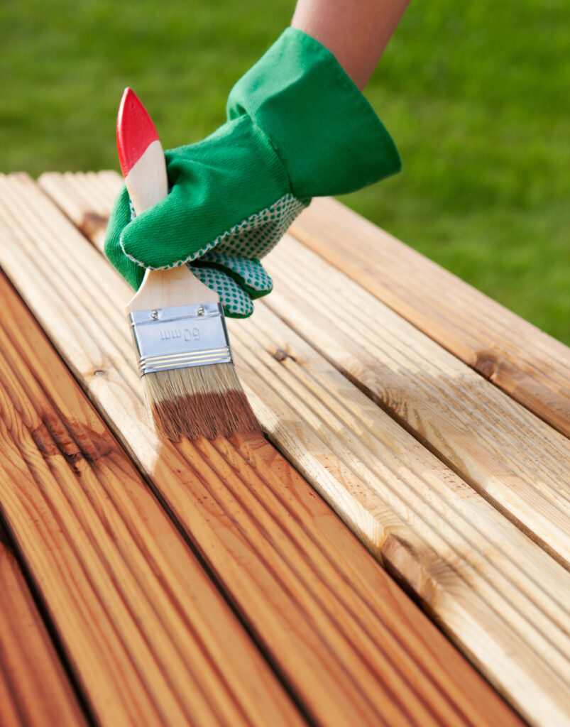 Staining timber