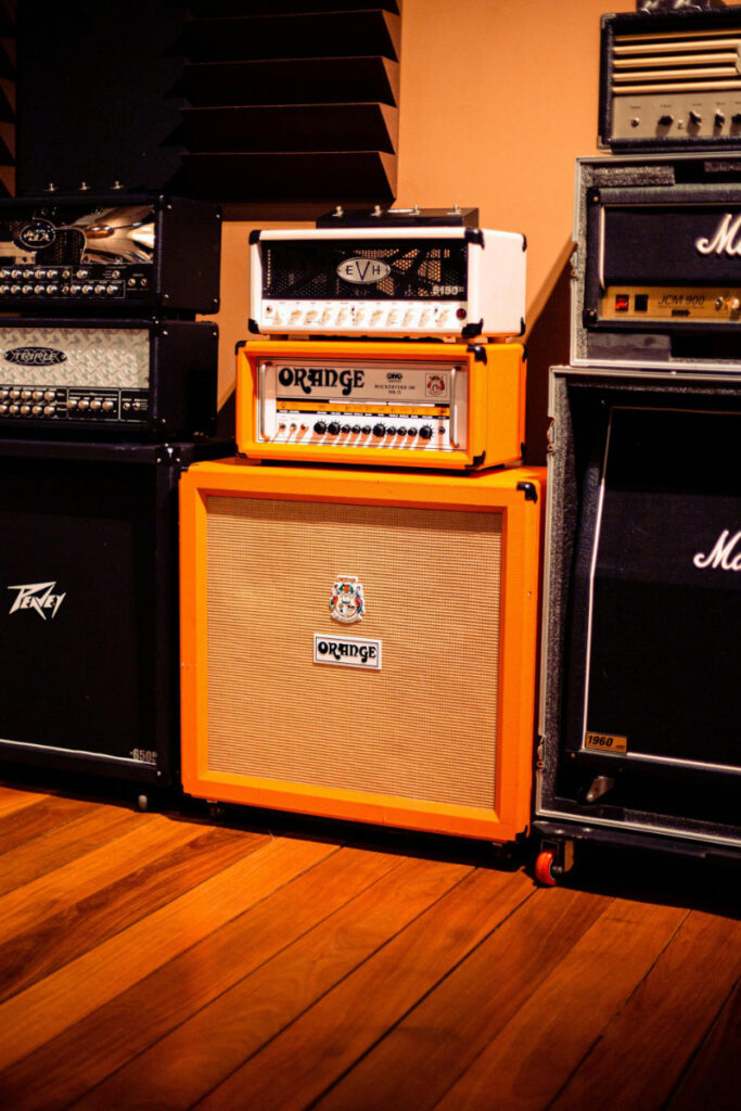 Jam room with wooden floors