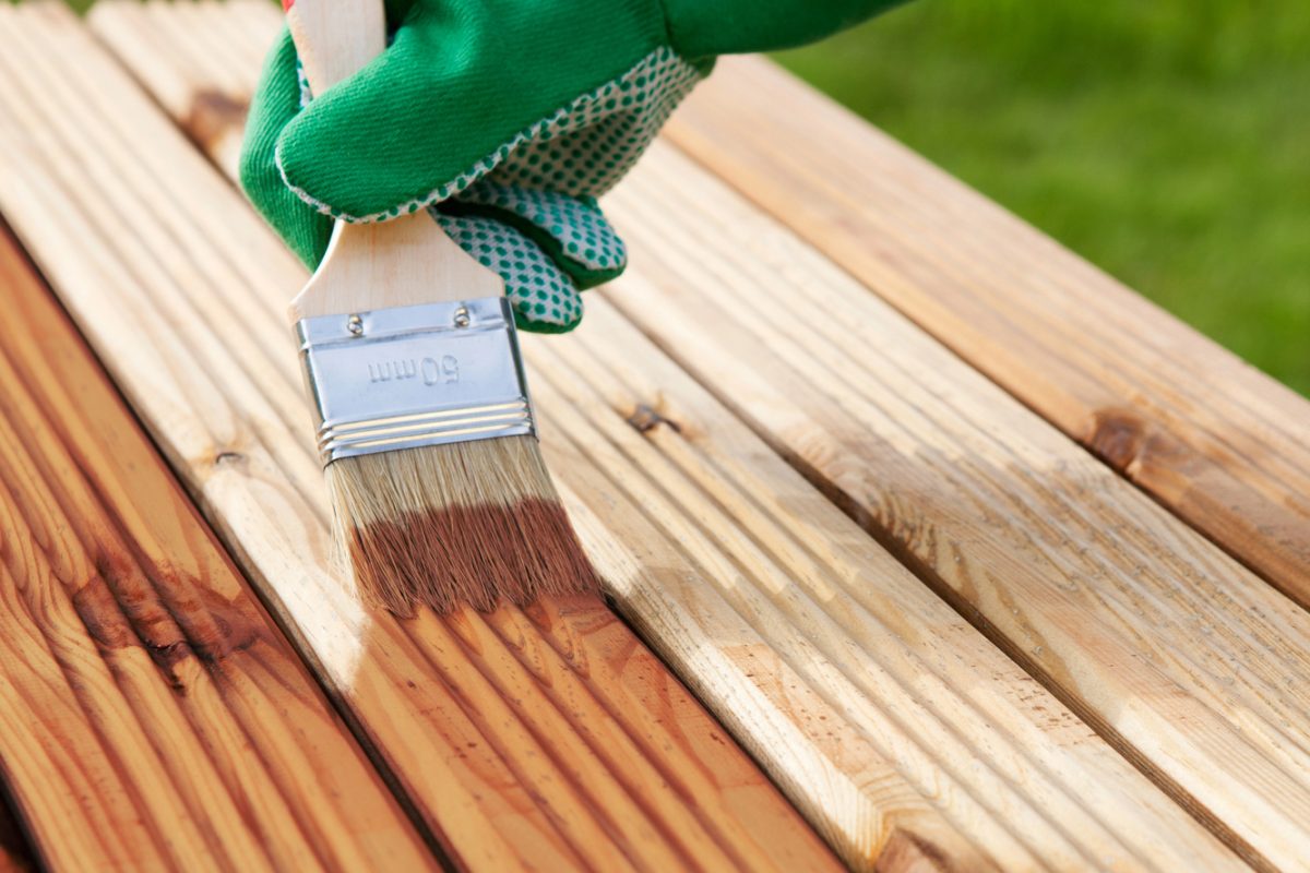 Staining timber